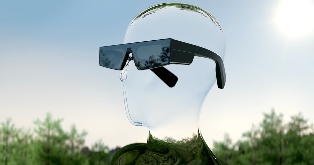 Black augmented-reality Spectacles displayed on a transparent mannequin head outdoors